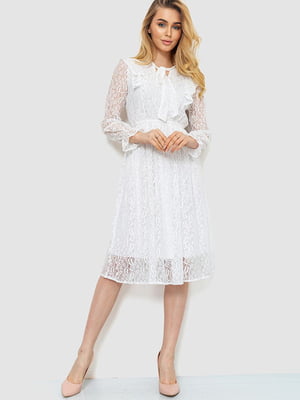Біла ажурна сукня А-силуету із зав'язкою та оборками на ліфі | 6782056