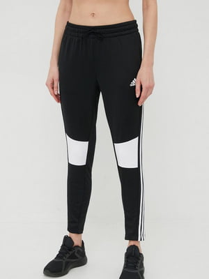 Чорні спортивні штани з білими вставками над колінами | 6791374