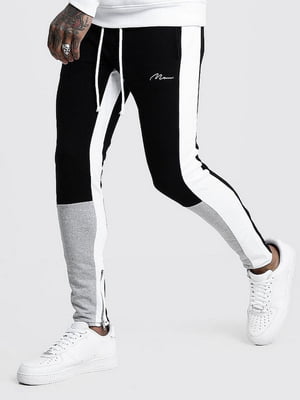 Чорно-білі спортивні штани на резинці | 6791510
