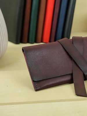 Шкіряний гаманець-клатч кольору бордо із закруткою | 6797768