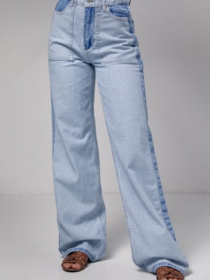 Блакитні джинси з лампасами та накладними кишенями | 6805589