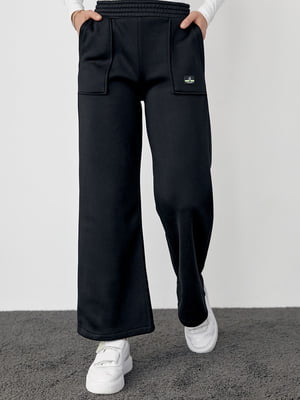 Чорні трикотажні штани на флісі з накладними кишенями | 6806943