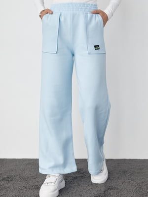 Трикотажні блакитні штани на флісі з накладними кишенями | 6806946