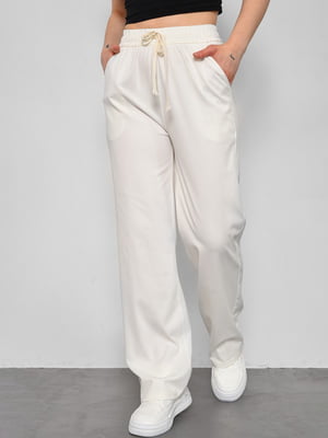 Розкльошені білі штани з кишенями | 6808883