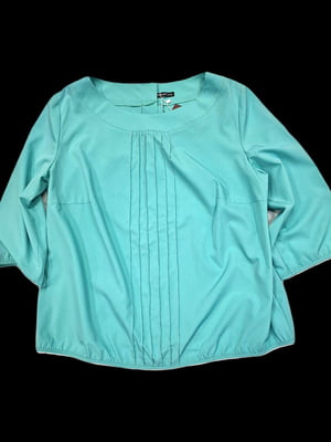Блуза блакитного кольору з гудзиками на спинці | 6765549