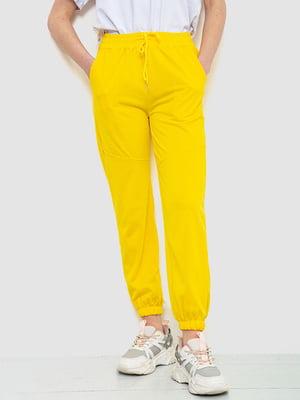 Жовті штани з манжетами на резинці | 6810572