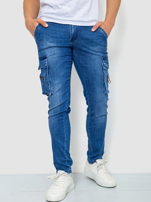 Синие джинсы с потертостями и накладными карманами | 6812521