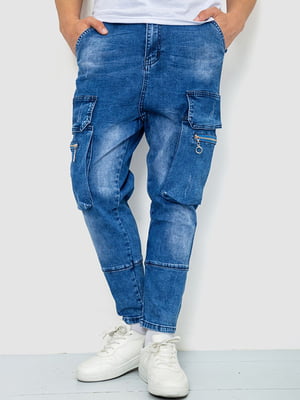 Синие джинсы с потертостями и накладными карманами | 6812522