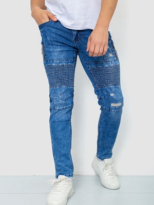 Синие джинсы с потертостями и карманами на молии | 6812524