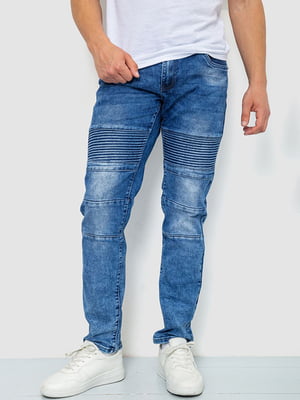 Сині джинси з потертостями та кишенями | 6812535