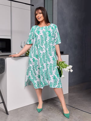 Зелена сукня А-силуету з контрастним принтом та кишенями | 6816554