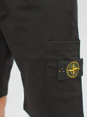 Трикотажні чорні шорти з аплікацією на кишені | 6817910