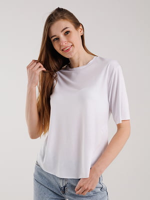 Біла футболка з асиметричним заокругленим низом | 6819021