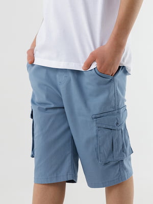 Блакитні подовжені шорти з накладними кишенями | 6819159