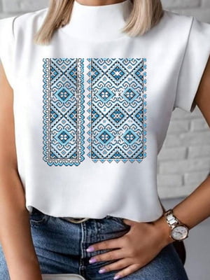 Біла дизайнерська блуза з блакитним українським візерунком | 6820661