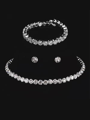 Набір "Lady": кругле намисто (11,5+5,5+4,5 см), браслет на руку (діаметр 6 см) та сережки зі стразами сріблястого кольору (діаметр 0,7 см) | 6826259