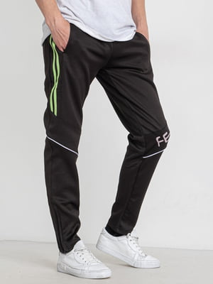 Підліткові чорні спортивні штани із салатовими смужками | 6835087