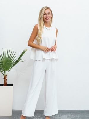 Білий костюм з текстурованого крепу: блуза та штани | 6844992