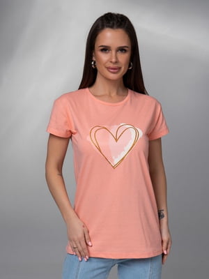 Персикова трикотажна футболка з великим серцем | 6845275