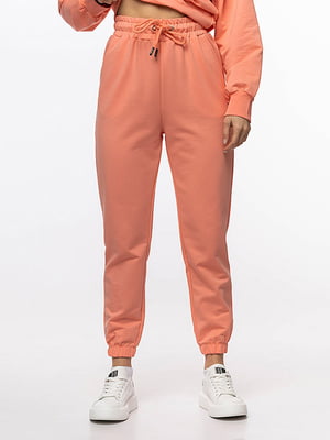 Жіночі спортивні штани S персиковий Yuki ЦБ-00210777 | 6841826