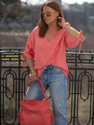 Блуза персикового кольору з рукавом на зав’язках | 6846372