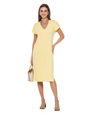 Жовта сукня-футляр з фігурним вирізом | 6831831