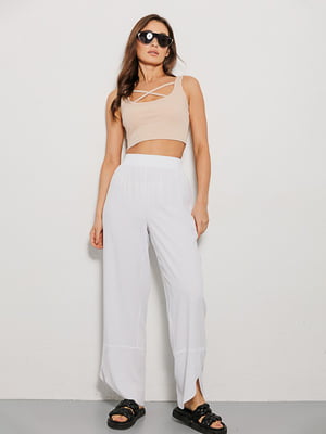 Літні білі штани з асиметричним низом | 6853438