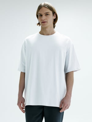 Бавовняна біла футболка вільного фасону | 6860055