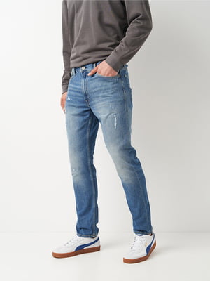 Синие джинсы из стираного денима с потертыми деталями и стандартной талией | 6865368