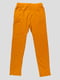 Штани помаранчеві в принт | 4506436 | фото 2