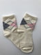 Шкарпетки молочного кольору | 5106881