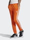 Штани спортивні помаранчевого кольору | 5120110