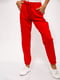 Штани червоного кольору з декором-лампасом | 5530378 | фото 4