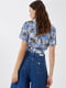 Блуза-топ блакитного кольору з квітковим принтом | 5708596 | фото 2