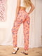 Штани персикового кольору в квітковий принт | 5772824 | фото 4
