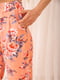 Штани персикового кольору в квітковий принт | 5772824 | фото 5