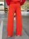 Штани розкльошені помаранчевого кольору | 5919988 | фото 2