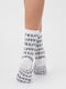 Шкарпетки білі в принт | 6006389 | фото 2