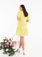 Платье А-силуэта желтое с цветочным принтом | 6022208 | фото 3