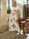 Платье А-силуэта молочного цвета с цветочным принтом | 6080224 | фото 2