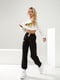 Жіночий весняний спортивний костюм батнік штани принт NASA розмір: 42-44, 46-48 чорний, 42/44 | 6253359 | фото 4