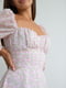 Платье А-силуэта бежевое в принт | 6260432 | фото 2