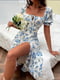 Сукня молочного кольору з квітковим принтом | 6285337