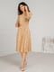 Платье А-силуэта бежевое с цветочным принтом | 6328012 | фото 2