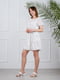 Сукня А-силуету біла з квітковим принтом | 6328018 | фото 2