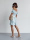Сукня А-силуету бірюзового кольору з принтом та драпіруванням спереду | 6333044 | фото 6