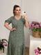 Платье А-силуэта зеленое с цветочным принтом | 6336792 | фото 2