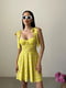 Сукня А-силуету жовта в принт | 6345247 | фото 2