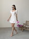 Платье А-силуэта молочного цвета в принт | 6345265 | фото 3