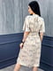Платье А-силуэта бежевое с цветочным принтом | 6366833 | фото 3